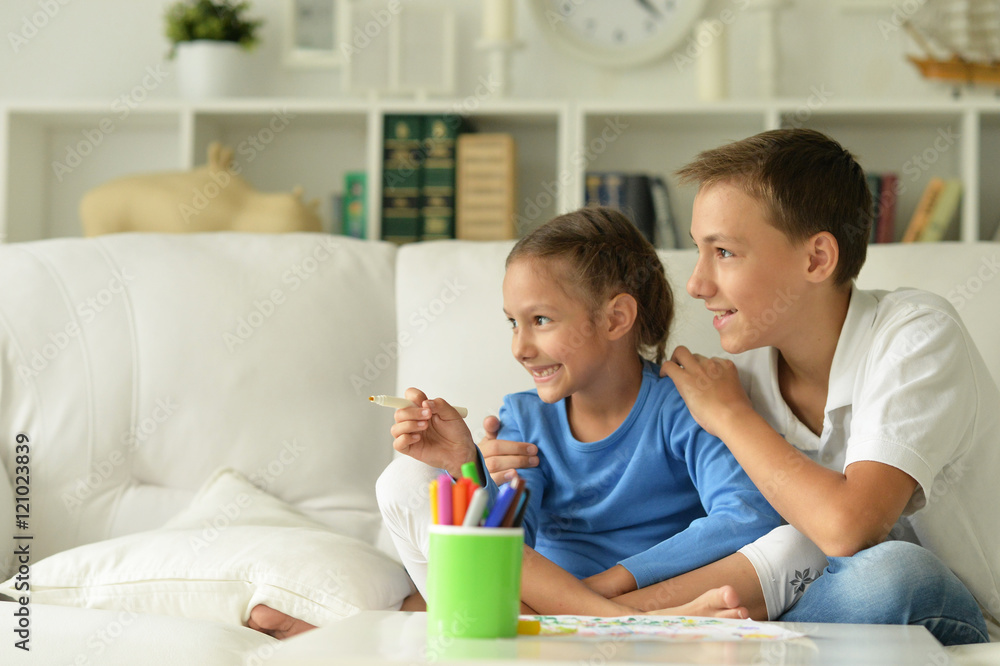 Little girl with boy drawing Little girl with boy drawing