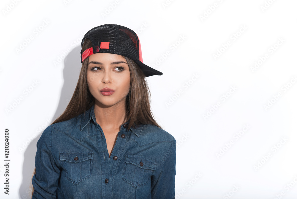 Cheerful hipster girl expressing her mistrust Cheerful hipster girl expressing her mistrust