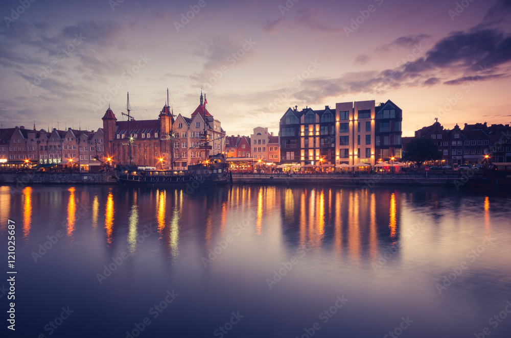 Obraz premium Waterfront in the evening with moored ship, Gdansk, Poland