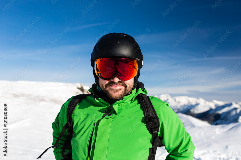 Happy skier with large oversized ski goggles Happy skier with large oversized ski goggles