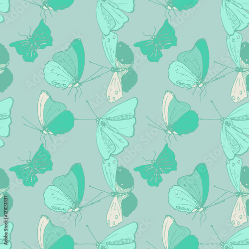Seamless pattern with mint-colored butterflies © irinia