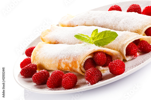 Crepes with raspberries and cream 