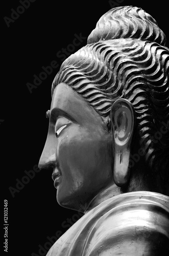 Face Buddha statues in black and white.