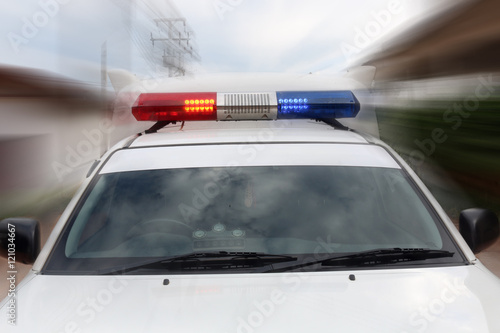 Red and blue emergency flashing siren.