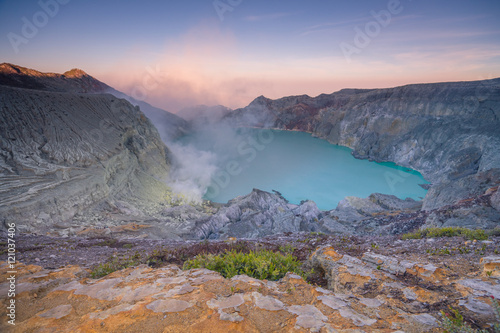 Sulfur fumes from the crater and Sunrise at Kawah Ijen Volcano