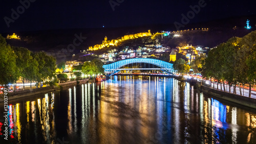 Tbilisi downtown. peace bridge made from glass, river Mtkvari, a