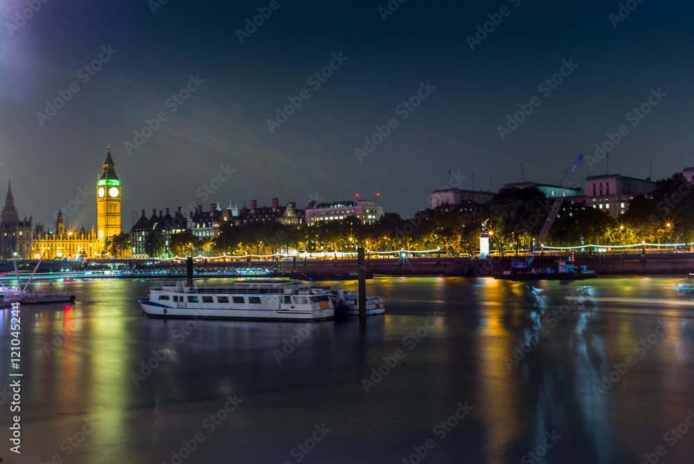 Big Ben and reflections in the Thames at night in London - 1