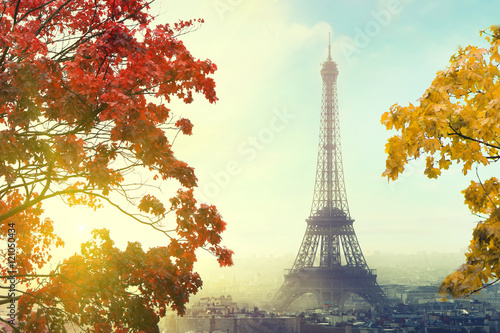Paris with Eiffel tower at sunset in autumn time