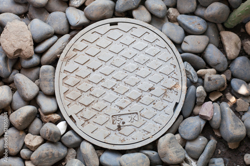 A lid of the sewer in Japan photo