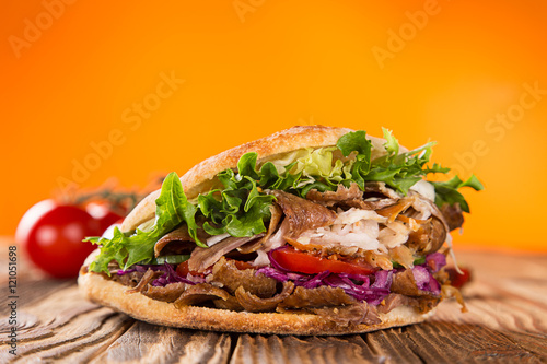close up of kebab sandwich.