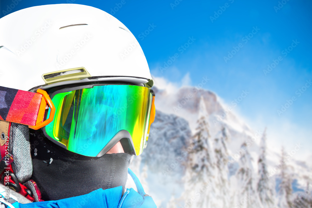 Skier skiing downhill in high mountains Skier skiing downhill in high mountains