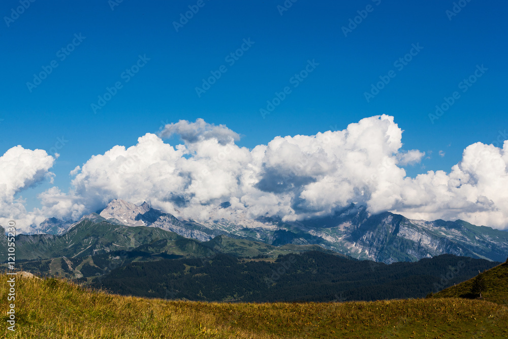 Clouds above mountains