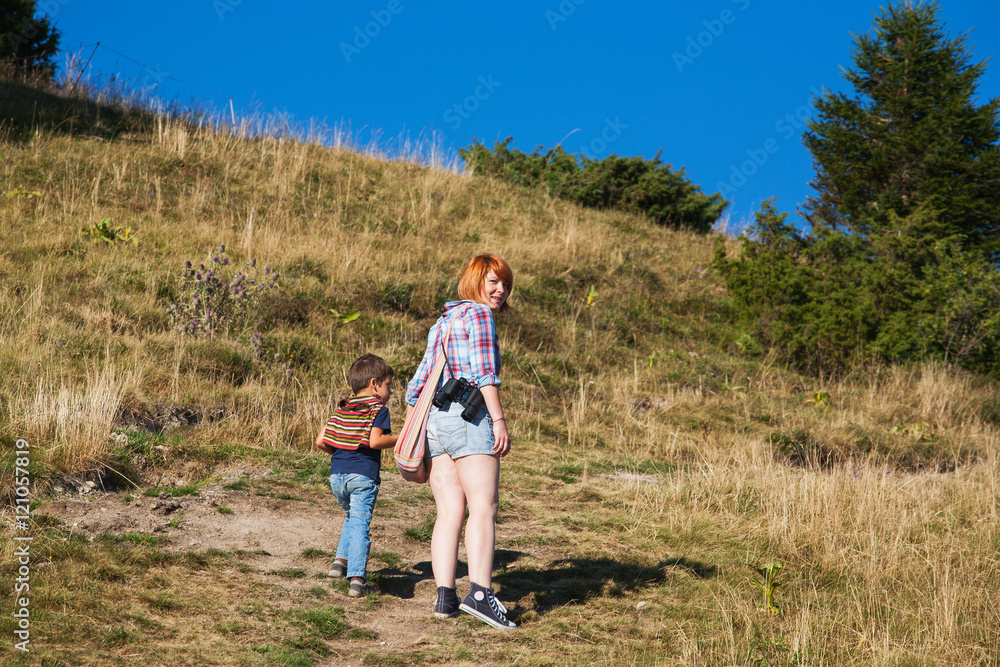 Mom and son hiking