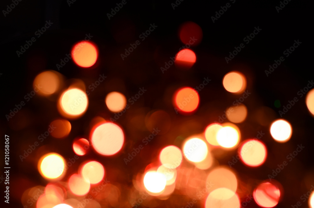 Fototapeta premium Bright christmas eve background. Plenty of golden sparkling bokeh from defocused garland lights.
