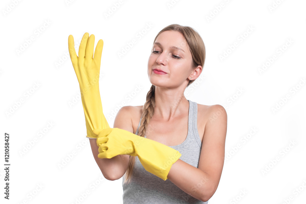 Woman ready for cleaning with rubber gloves and smiling Woman ready for cleaning with rubber gloves and smiling