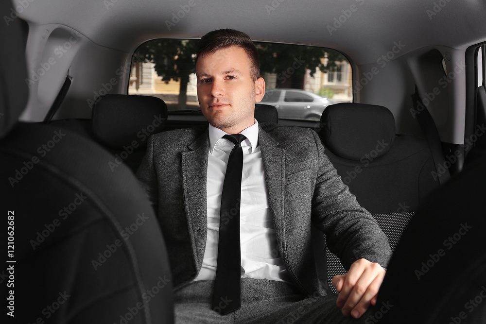 Businessman going to work by car Businessman going to work by car