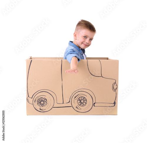Creative boy playing with c...