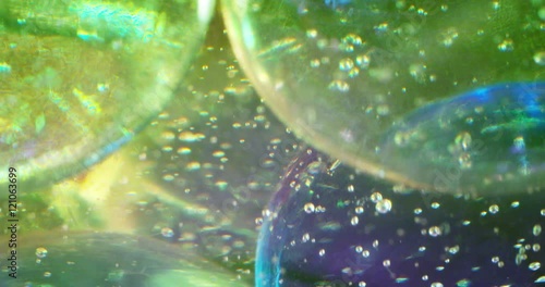 Abstract extrime macro composition of coloured liquids with glass spheres. 4k. Shot on RED.
