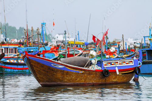 Wooden Asian boat in the port