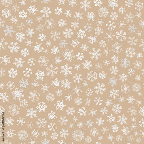 Seamless pattern of snowflakes, white on light brown