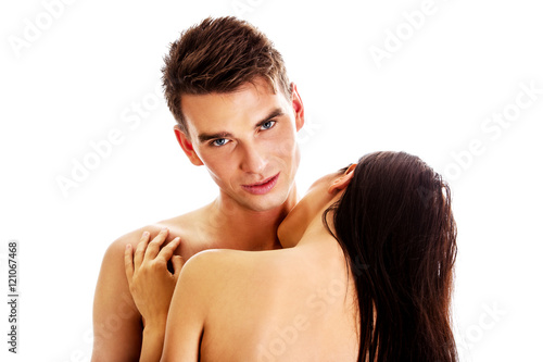 Beauty young woman kissing man's neck.