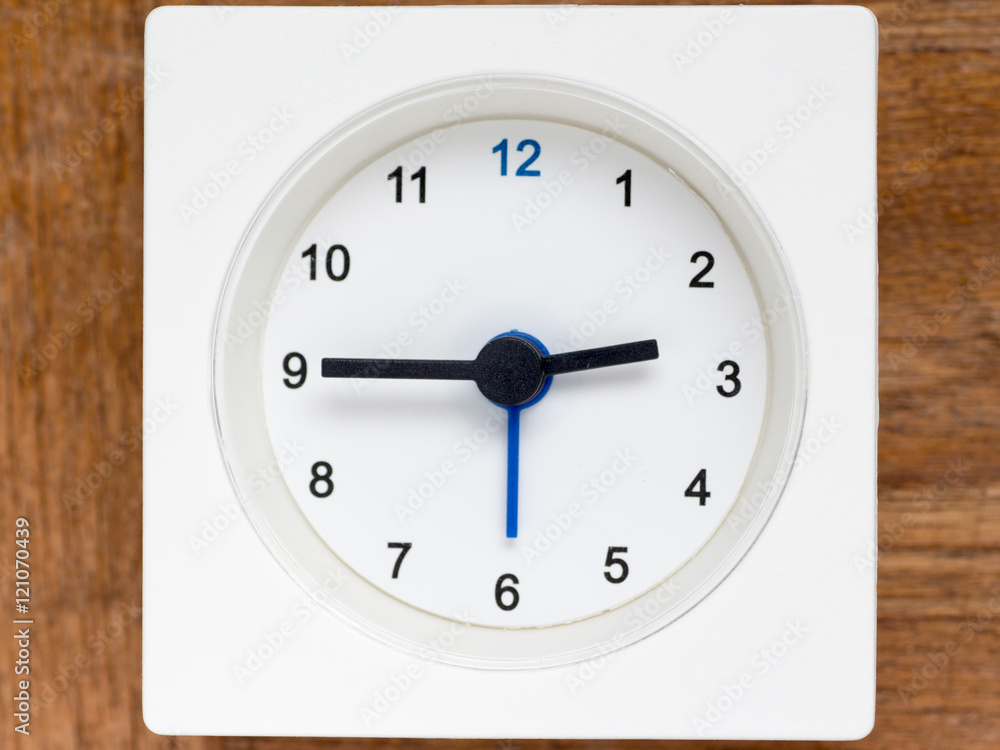 Series of the sequence of time on the simple white analog clock Series of the sequence of time on the simple white analog clock