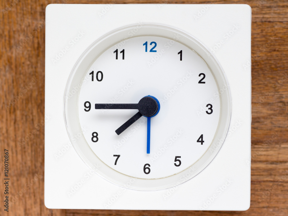 Series of the sequence of time on the simple white analog clock Series of the sequence of time on the simple white analog clock