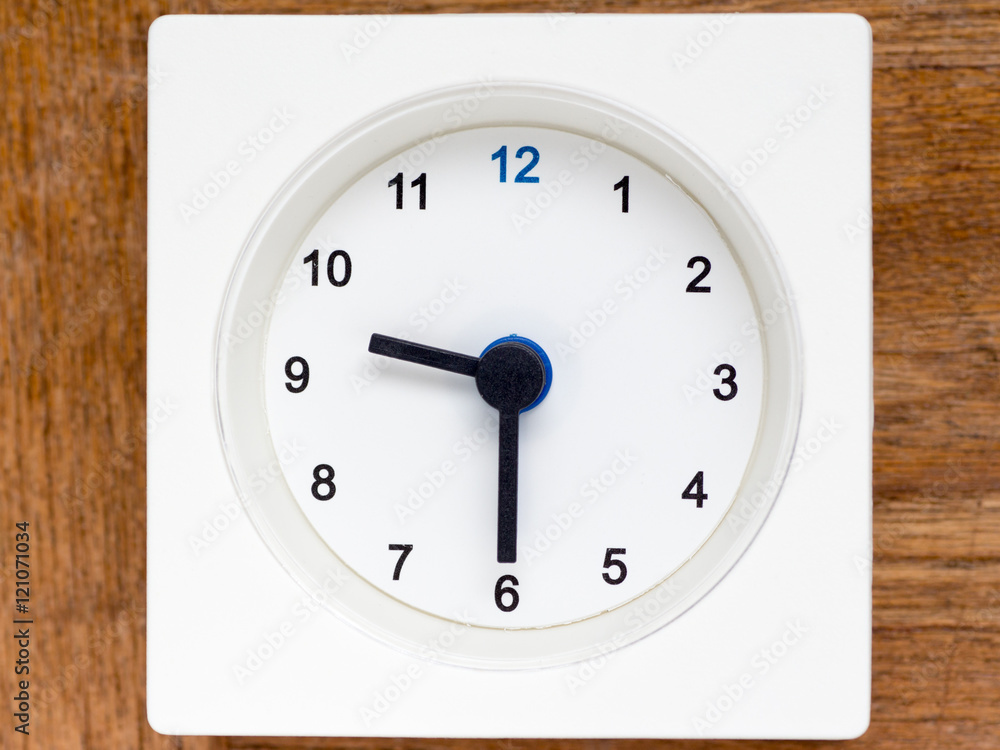 Series of the sequence of time on the simple white analog clock Series of the sequence of time on the simple white analog clock