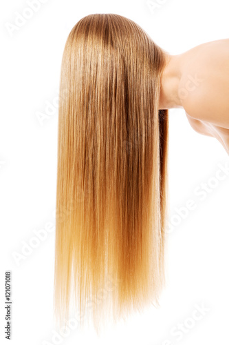 Girl with perfect long shiny blond hair.