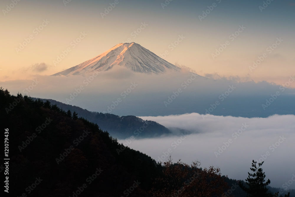 Fototapeta premium Mount Fuji with mist at sunrise, Japan