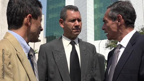 Confused Hispanic Business Men Talking