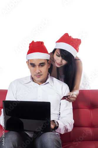 Couple buy christmas gift by online