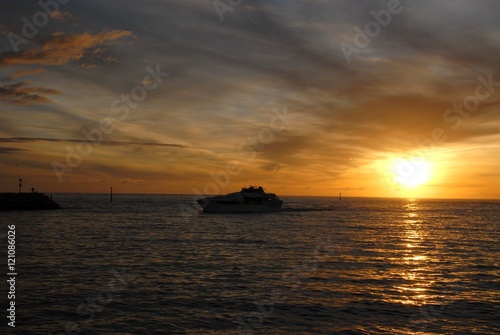 sunset with passenger ferry