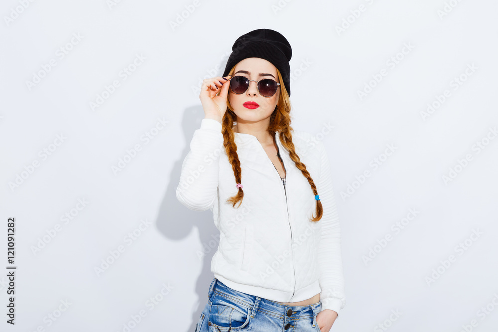 Cute teenage girl posing on white background