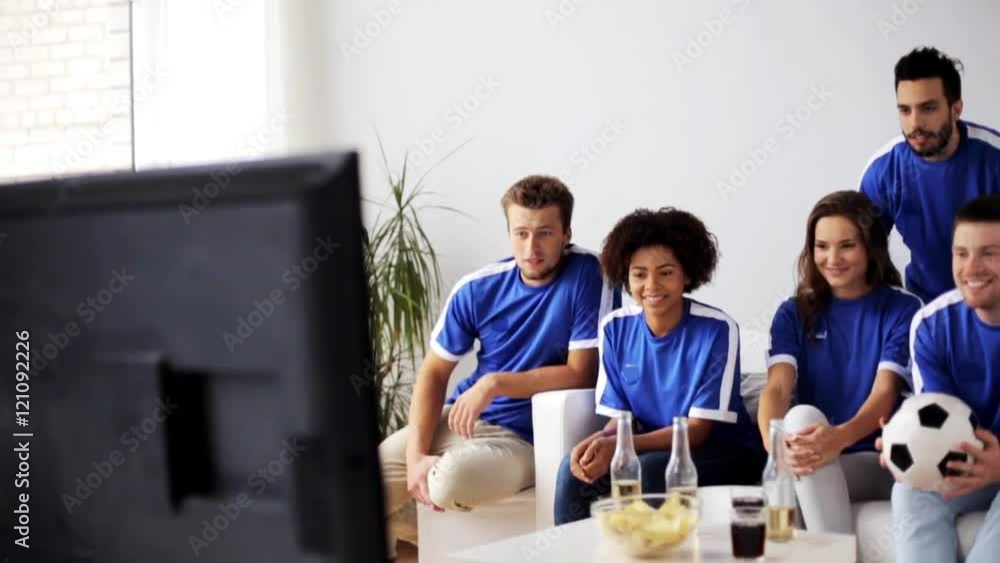 friends or football fans watching soccer at home friends or football fans watching soccer at home