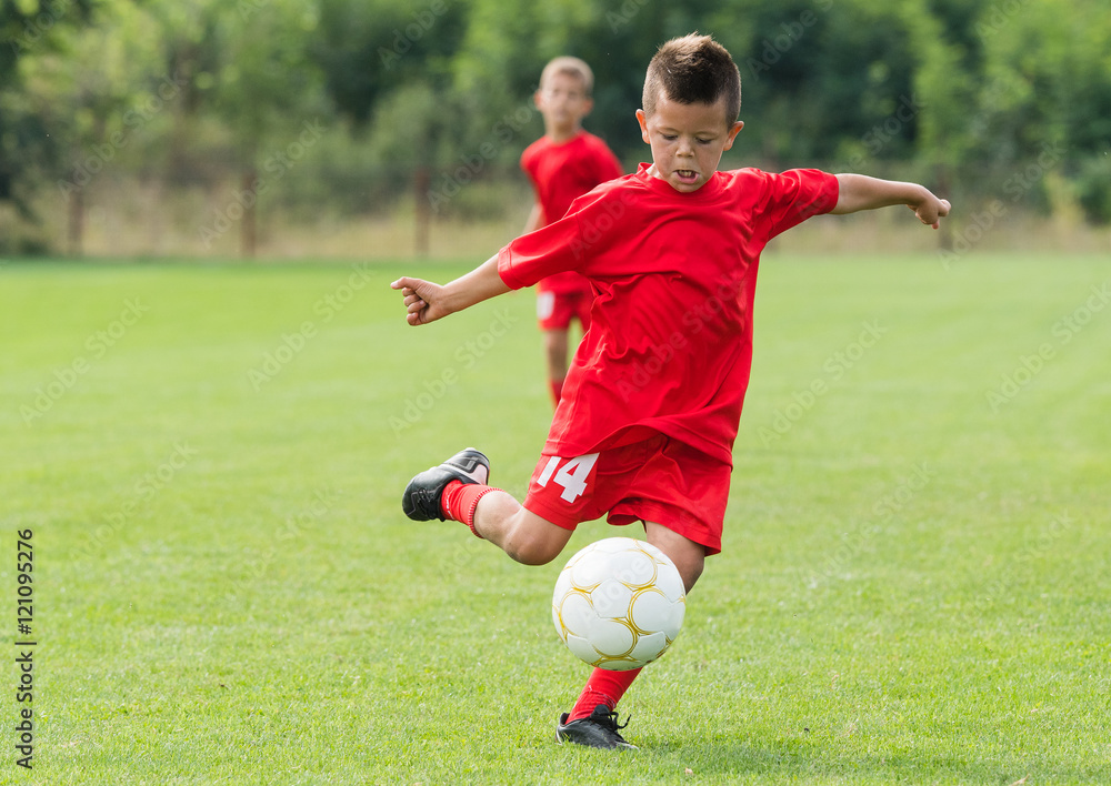 Boy Shooting at Goal