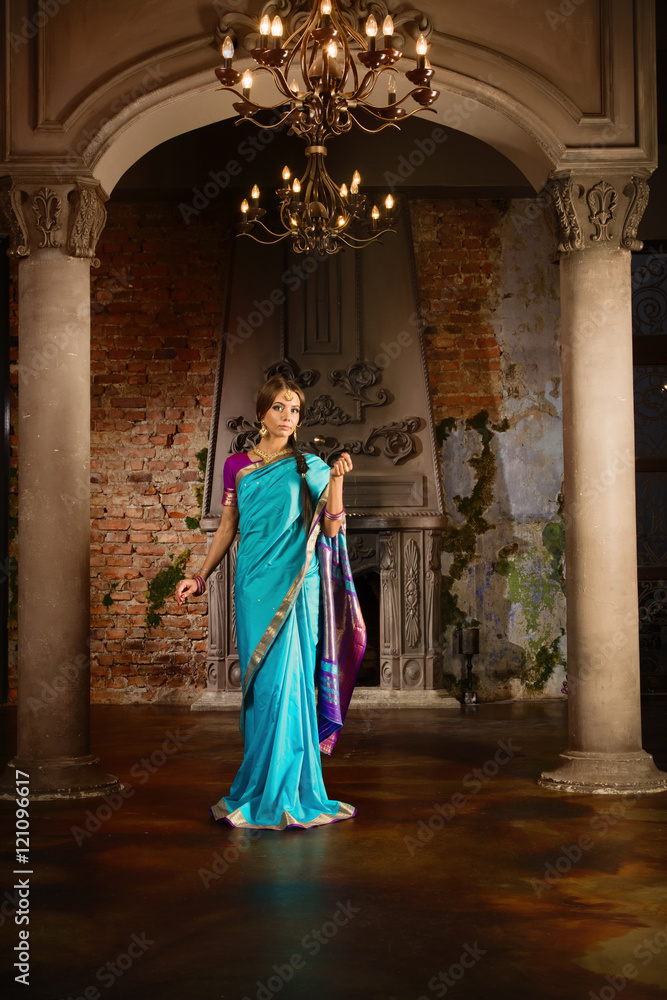 Beautiful young woman in traditional indian clothing