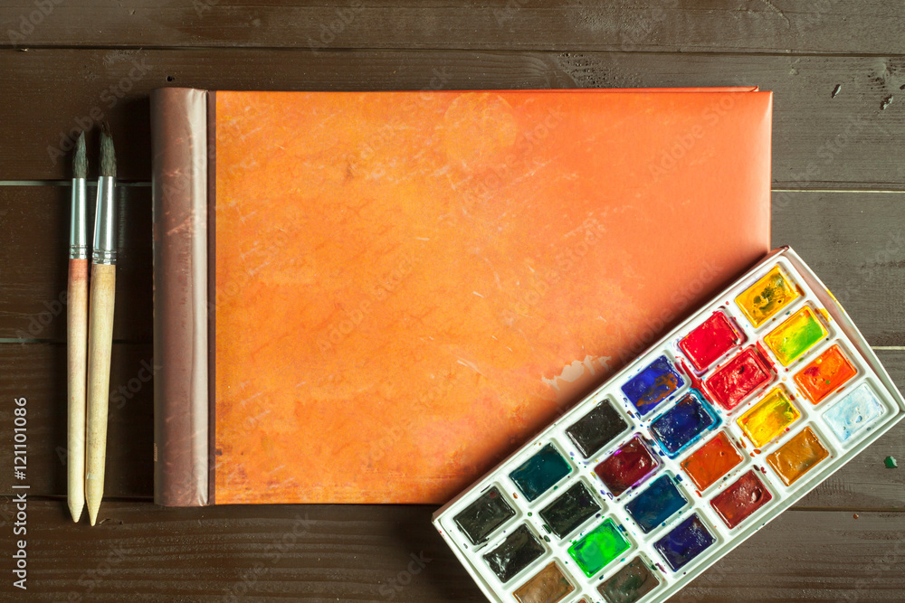 Fototapeta premium Set of watercolor paints and paintbrushes for painting