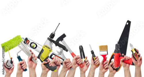 Hands holding tools