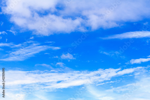 Blue sky background with white clouds. The vast blue sky and clouds sky on sunny day. White fluffy clouds in the blue sky. © phanthit malisuwan