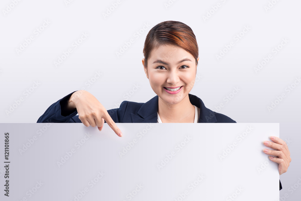 Young attractive asian woman showing a white board Young attractive asian woman showing a white board