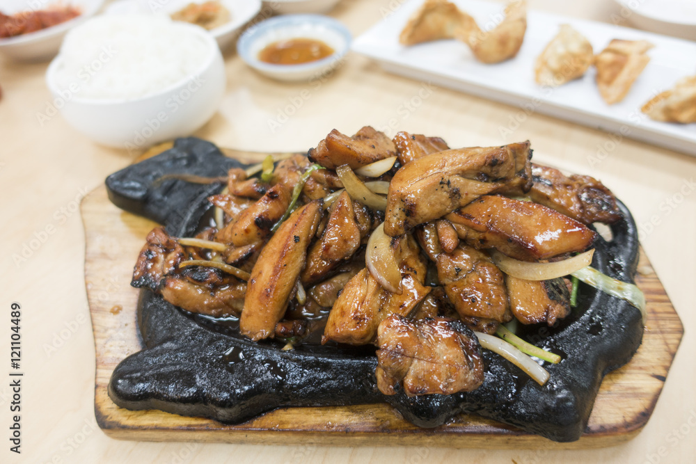 Marinated BBQ Chicken Hot Plate Dish at a Korean Food Restaurant Stock