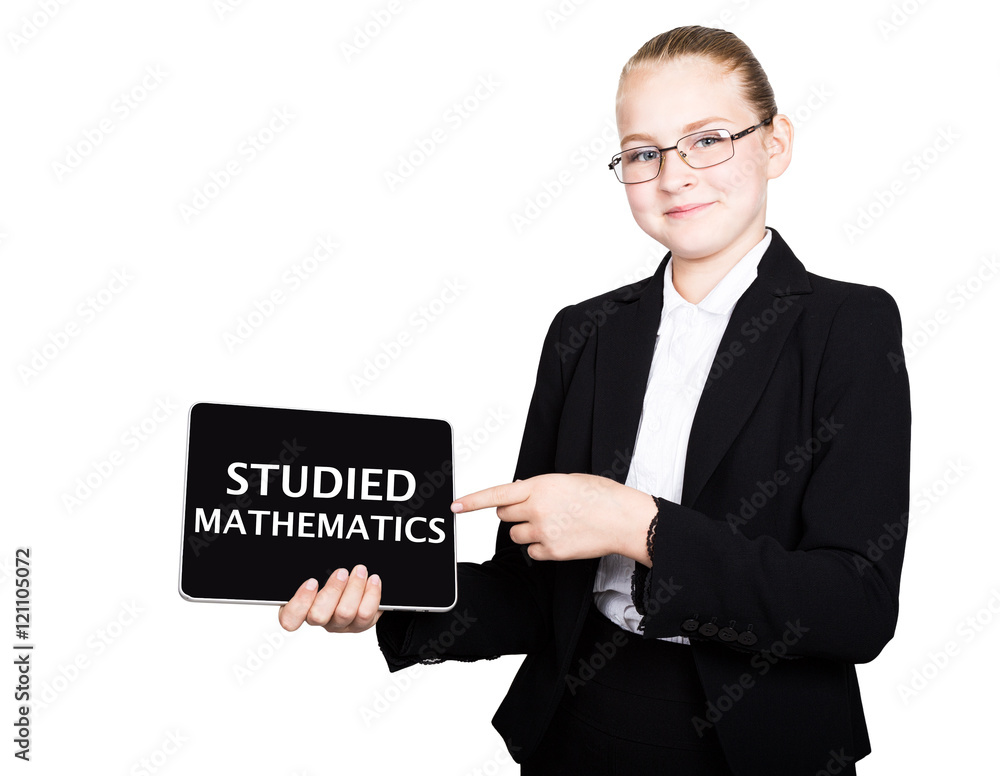 Beautiful school girl in a business suit holds a pc tablet in his hands and looking into the camera, on a pc tablet inscription studied mathematics Beautiful school girl in a business suit holds a pc tablet in his hands and looking into the camera, on a pc tablet inscription studied mathematics