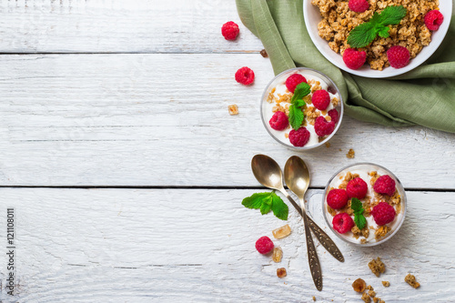 Fototapeta Naklejka Na Ścianę i Meble -  Breakfast concept. Muesli granola berries homemade yogurt