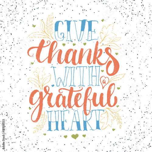 Give thanks with a greatful heart - Thanksgiving day lettering calligraphy phrase with leaves and hearts. Autumn greeting card isolated on the white background.