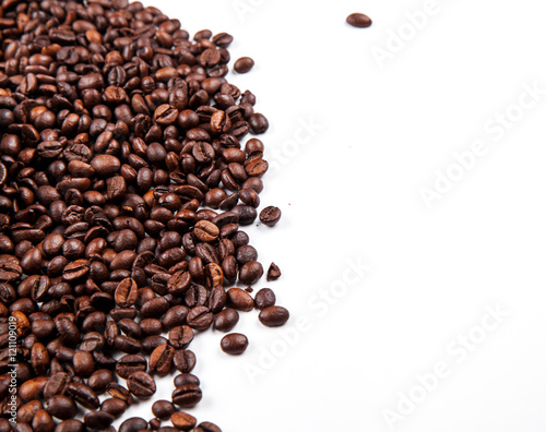 Frame of roasted coffee beans isolated on white