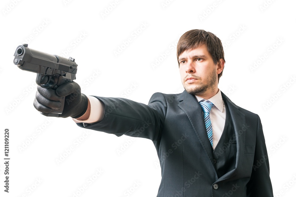 Killer is aiming with pistol. Isolated on white background. Killer is aiming with pistol. Isolated on white background.