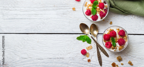 Breakfast concept. Muesli granola berries homemade yogurt