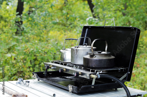 camping kettles on the stove