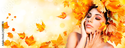 Fall Girl - Beauty Model Woman With Orange Autumn Leaves Hairstyle
